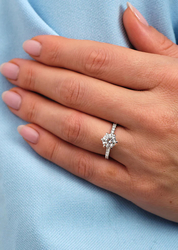 Elegant Symbolism in a Modern Round Engagement Ring Design